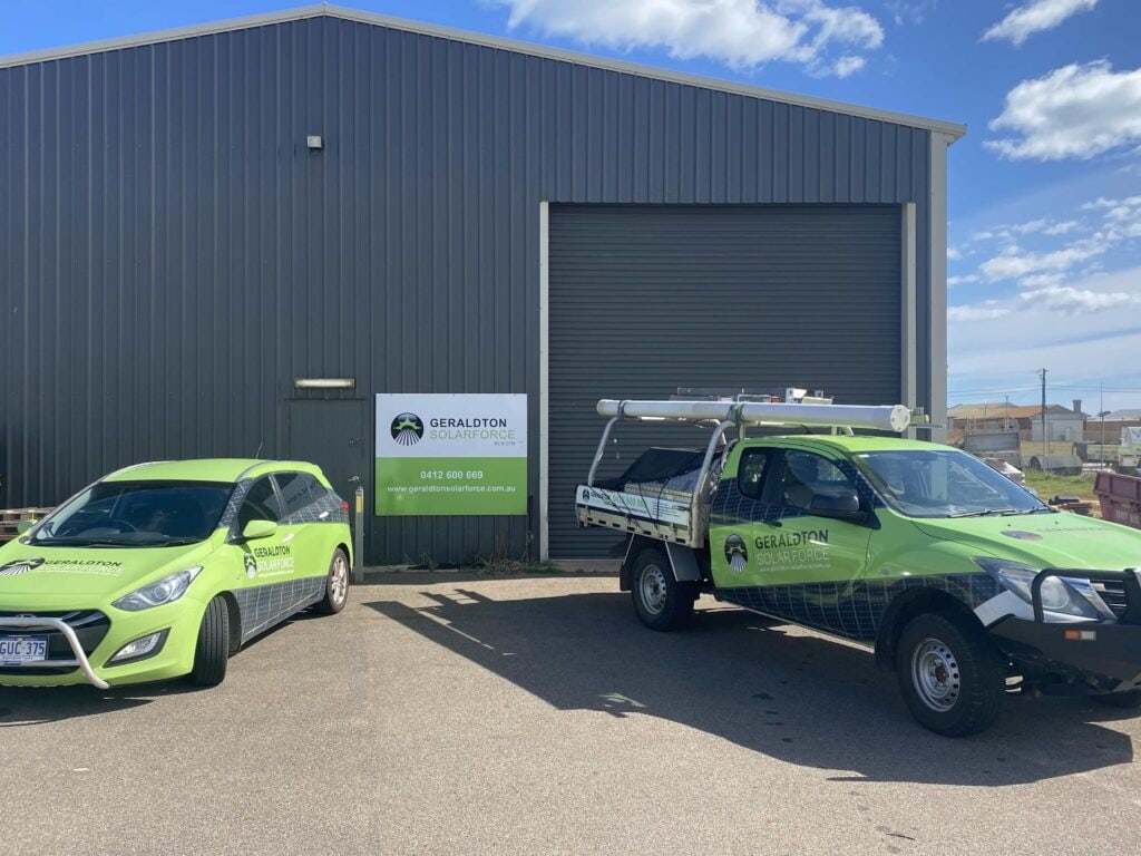 Geraldton Solar Force cars in front of a shed